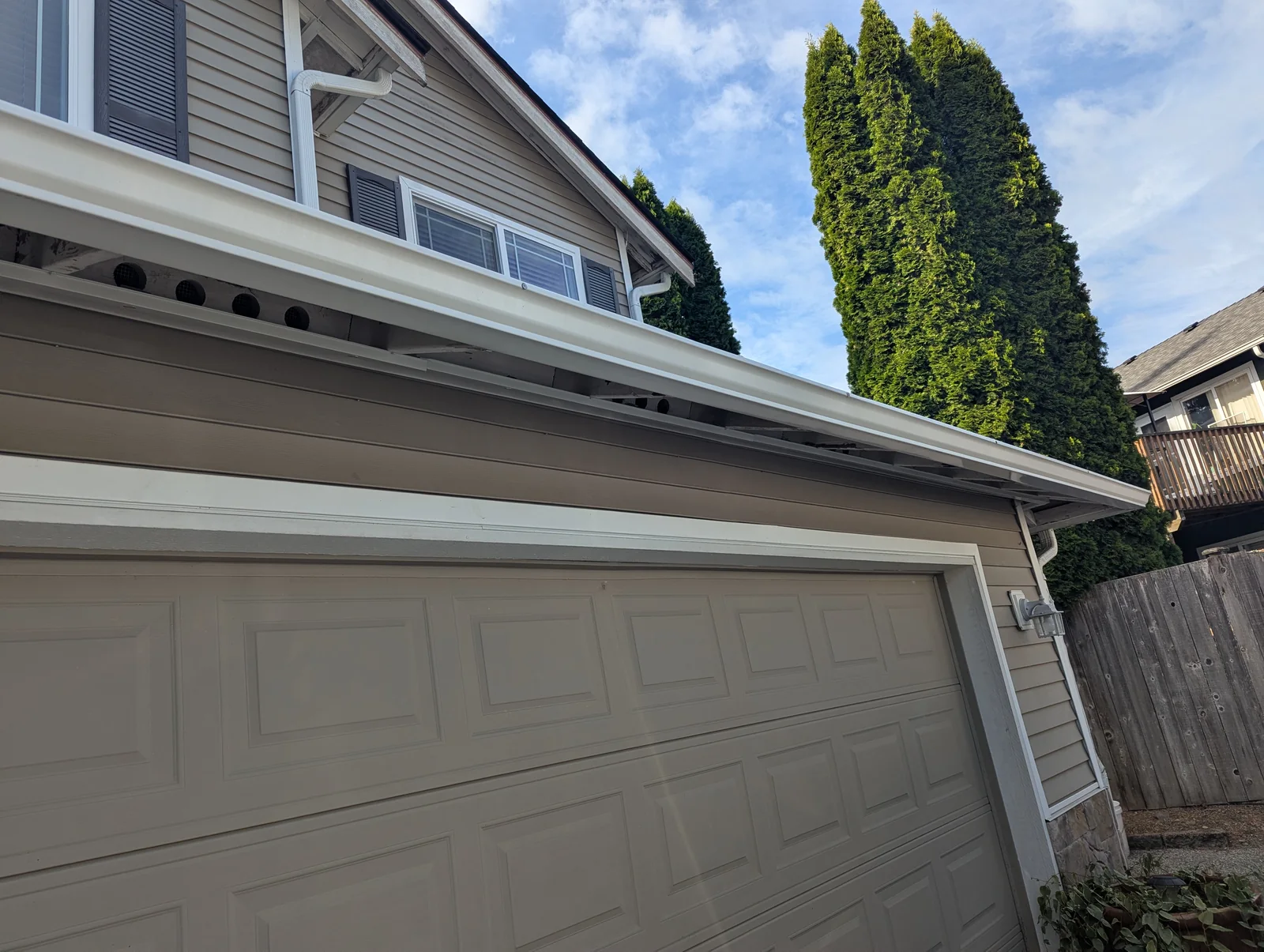 Exterior gutter cleaning at a Frederickson home