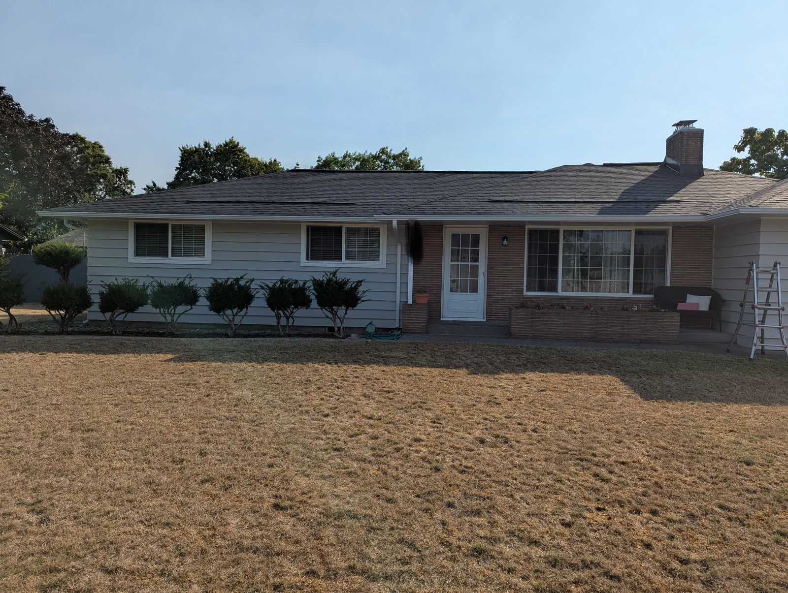 Lakewood home after gutter and downspout replacement